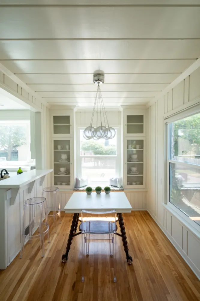 Bright dining room with a polished hardwood floor